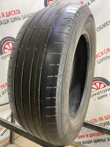 Bridgestone dueler HP R18 235/60.